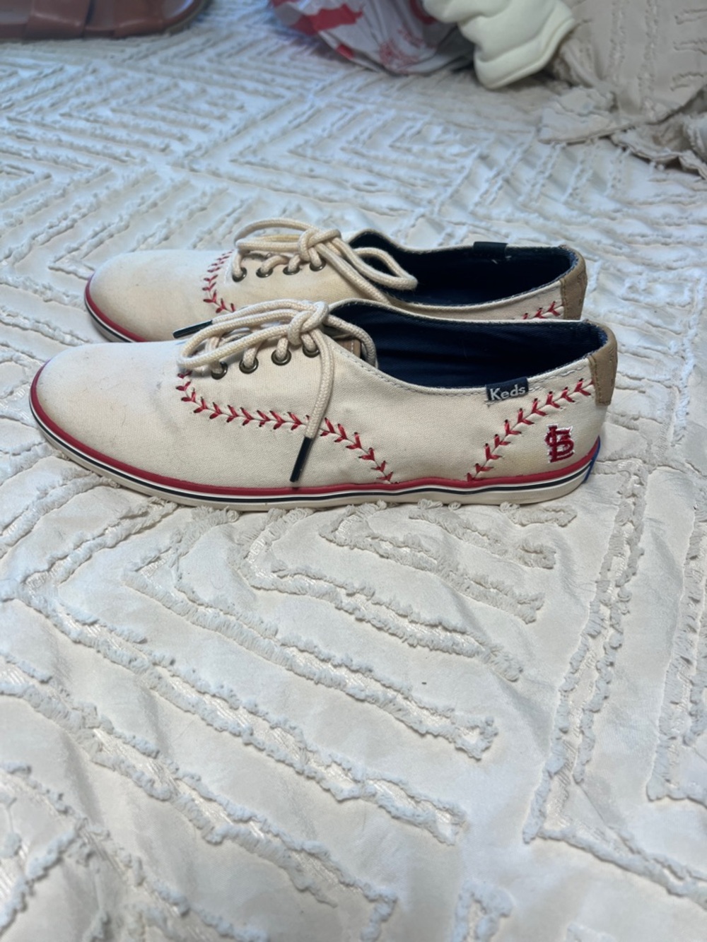 Keds White Canvas Sneakers with Red Stitching and Logo